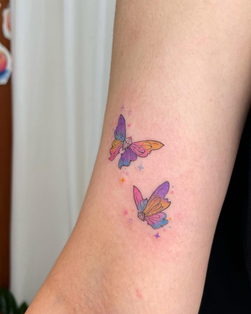 Barbie butterflies tattoo