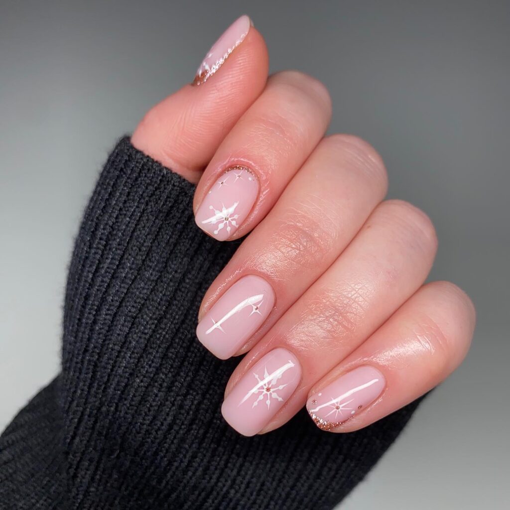 milky pink snowflake nails