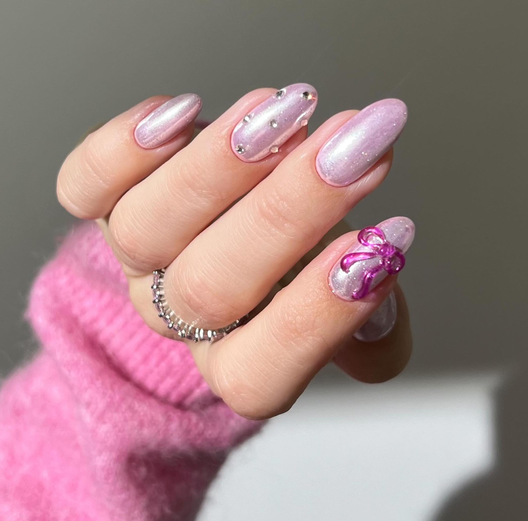 pink chrome coquette nails