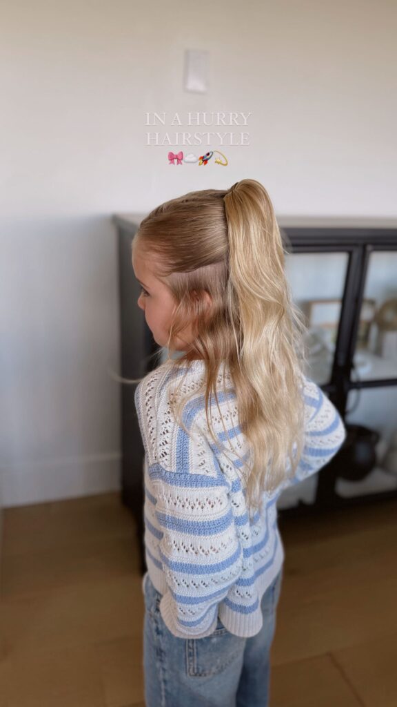 half up topsy tail hairstyle