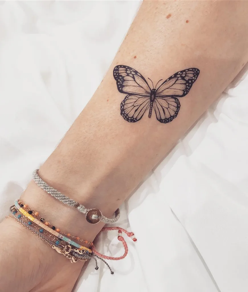 black monarch butterfly tattoo