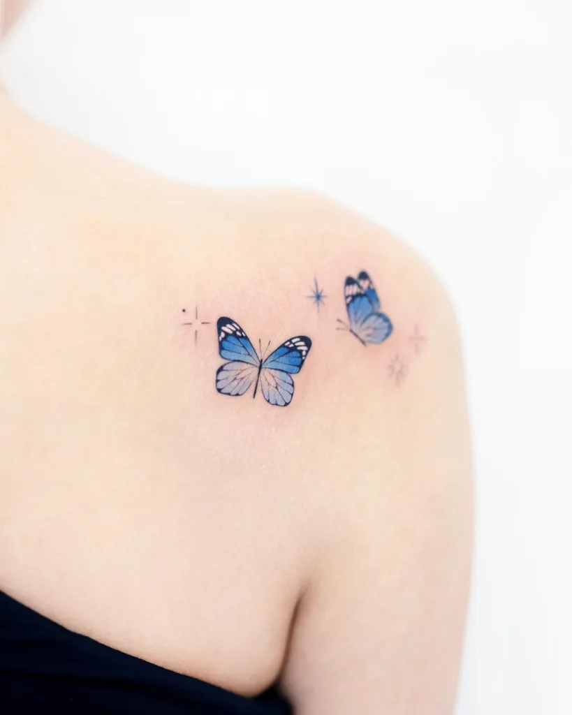 blue butterflies shoulder tattoo