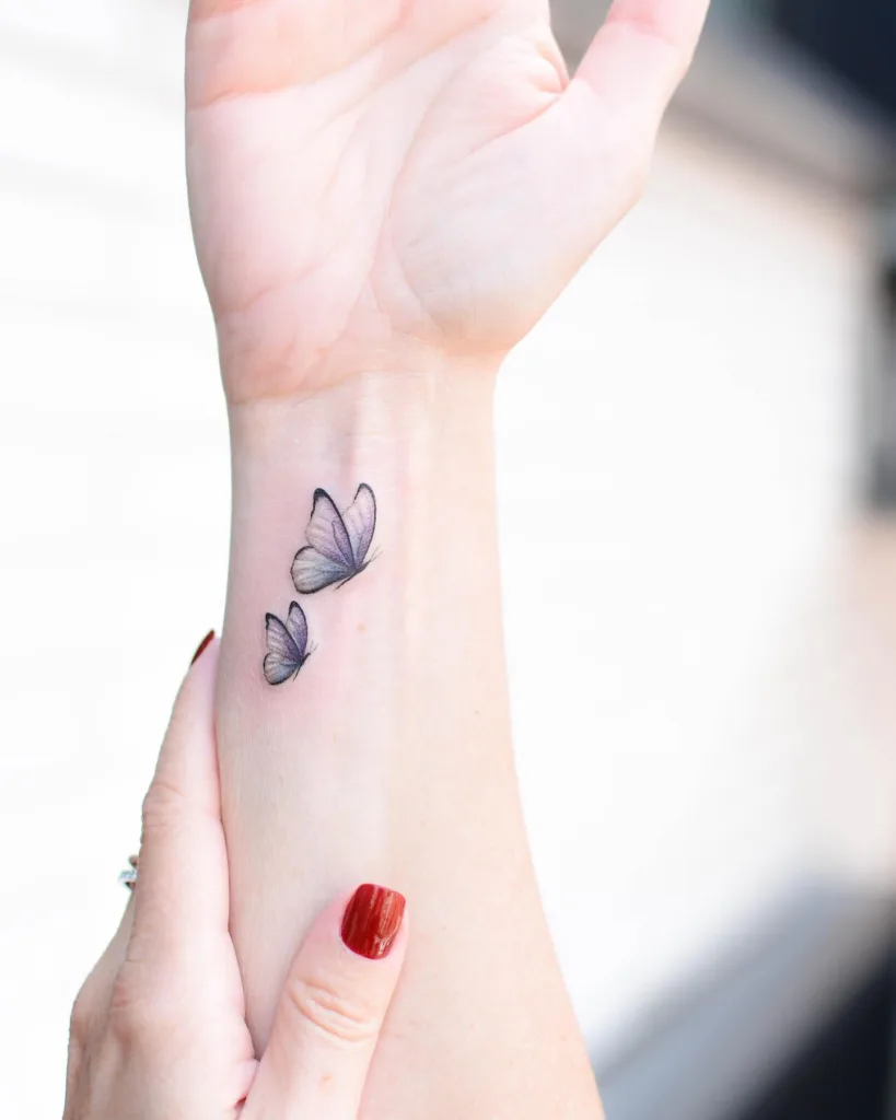 butterflies wrist tattoo