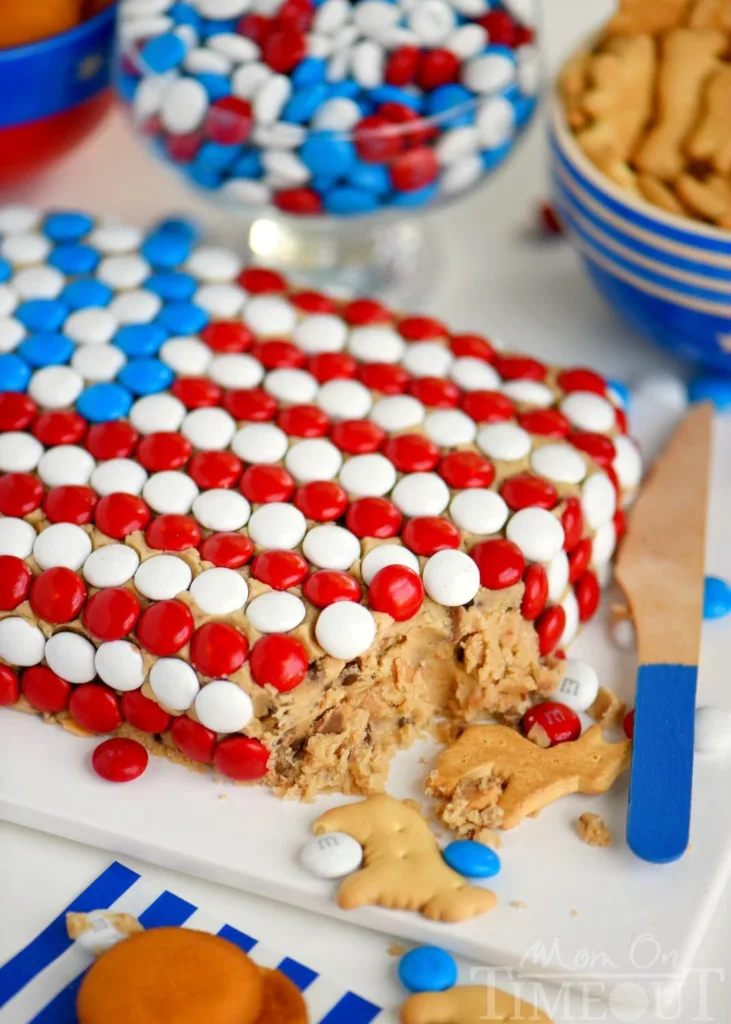 american flag chocolate chip cookie dough dessert topped with red, white, and blue candy