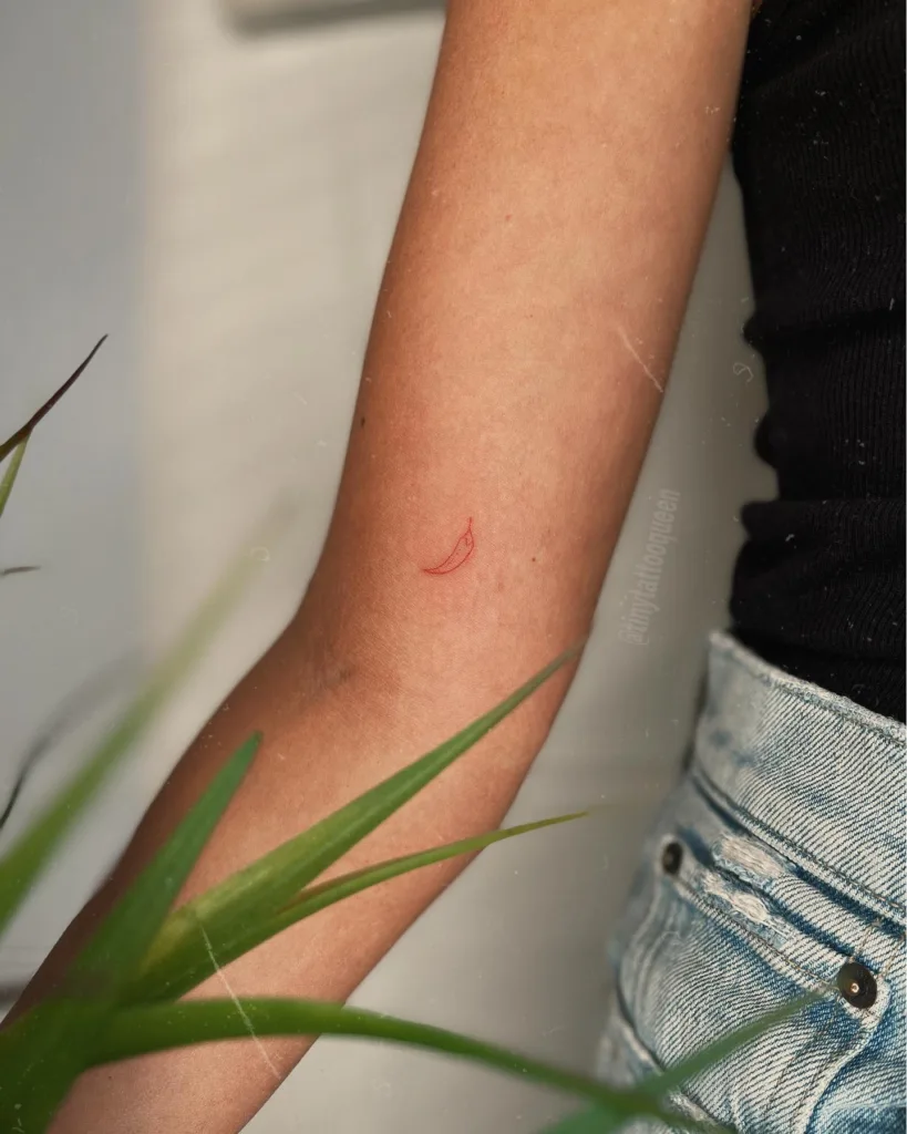 cute teeny red chili tattoo