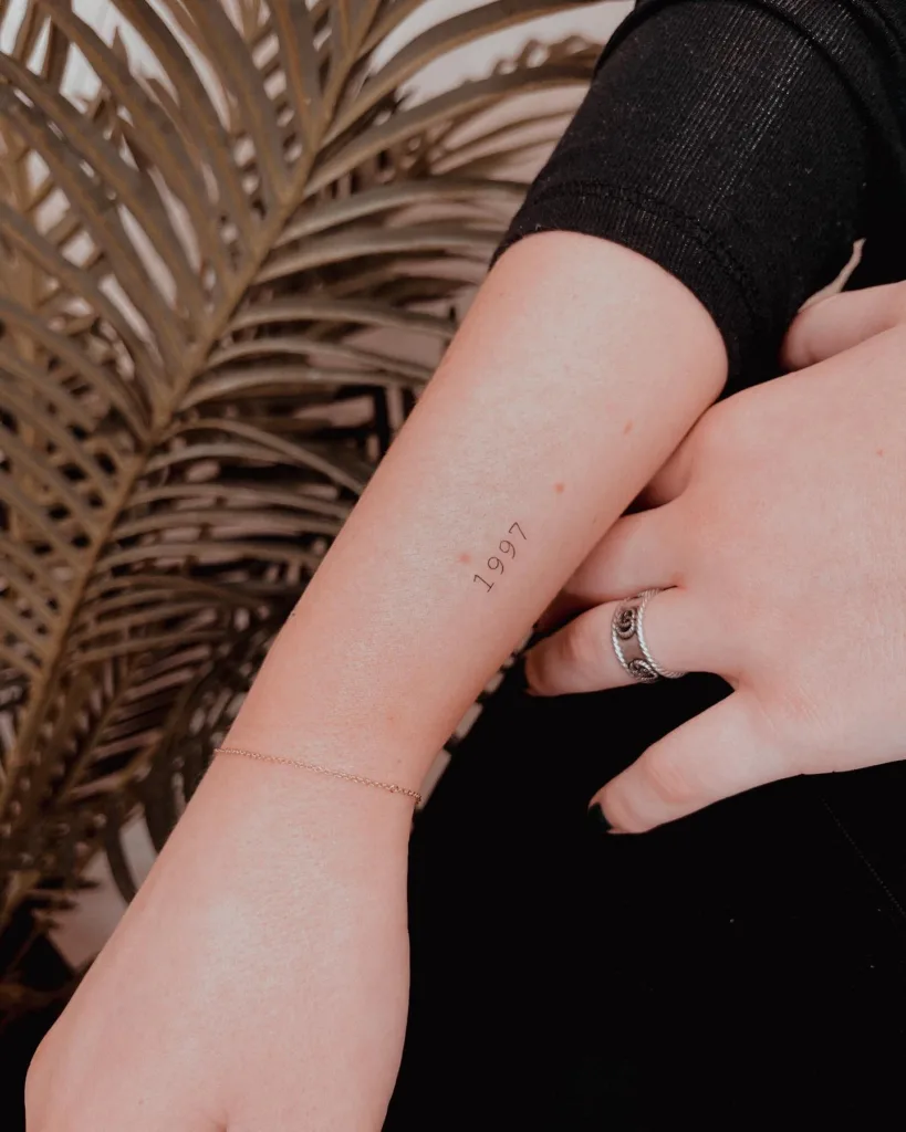 dob micro tattoo