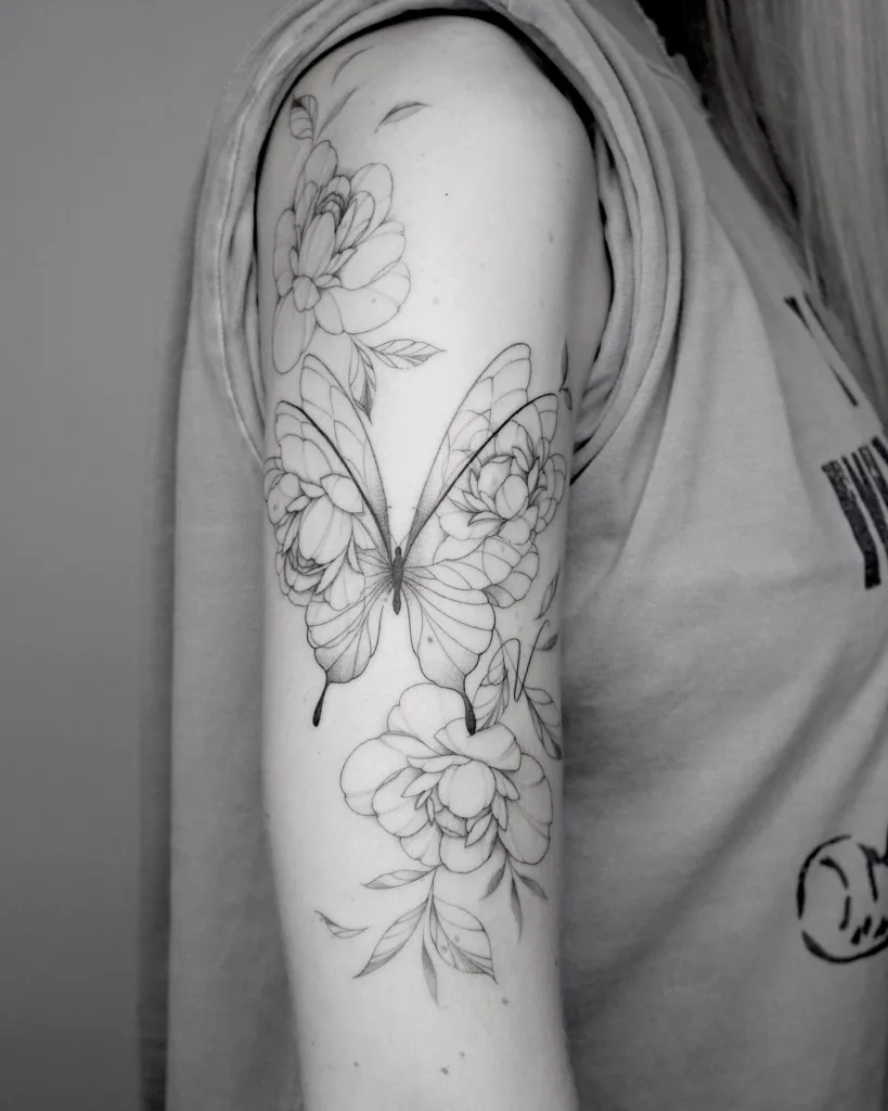 half sleeve butterfly and peonies