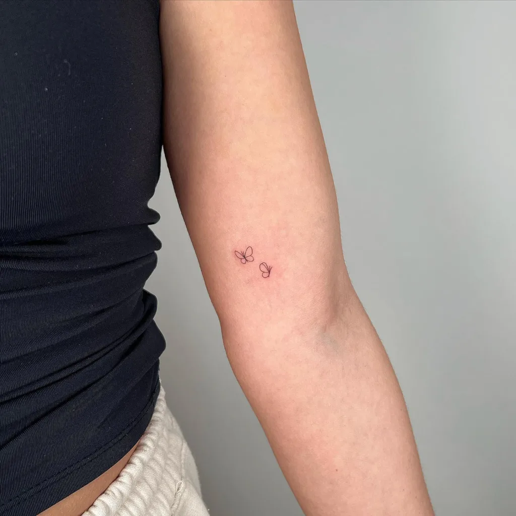 micro butterflies tattoo