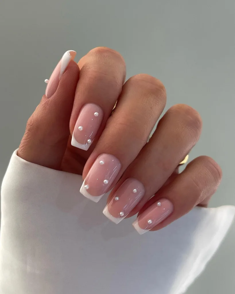 pearl studded white tip nails