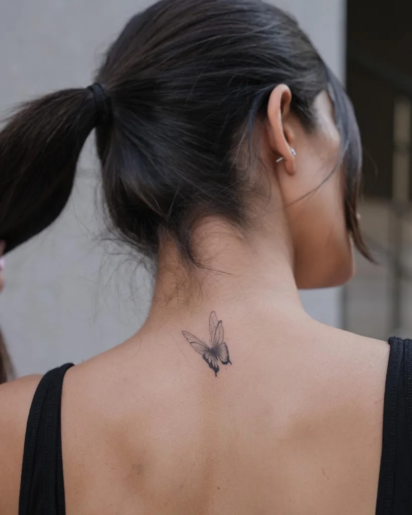 upper back butterfly tattoo
