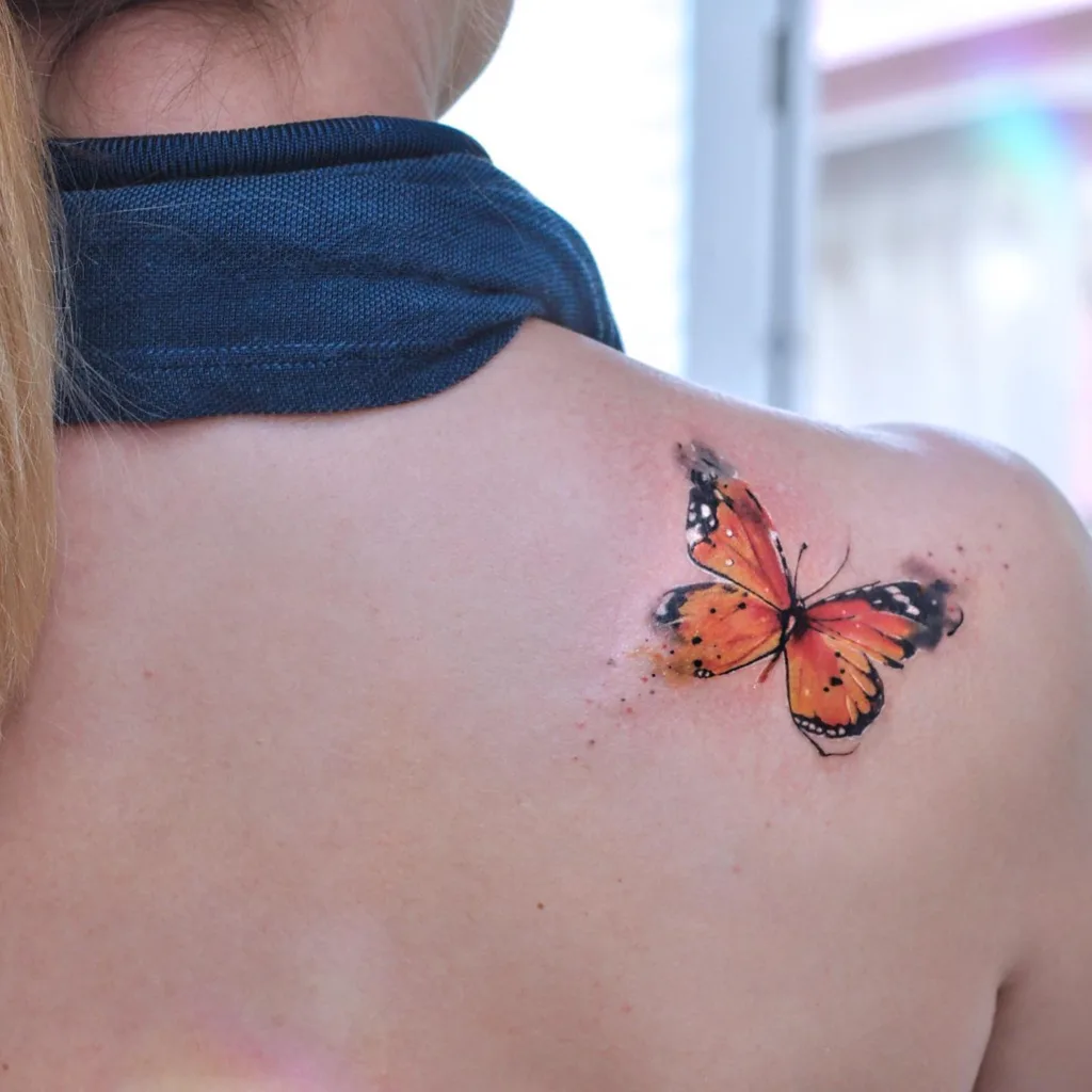watercolor shoulder butterfly tattoo