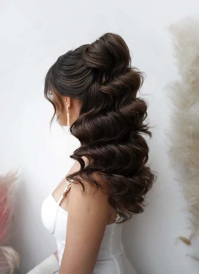 glam half-up flipped ponytail