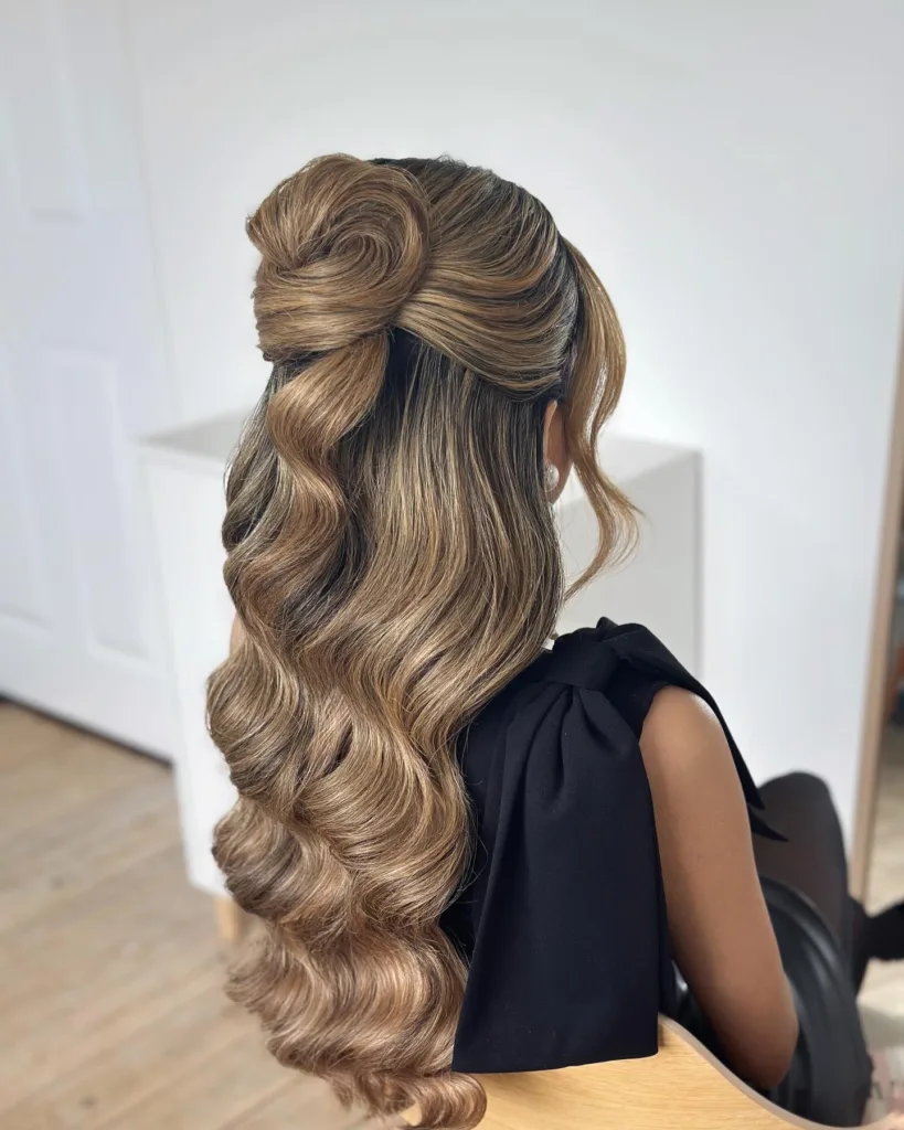 rose-inspired half-up bun with sculpted waves