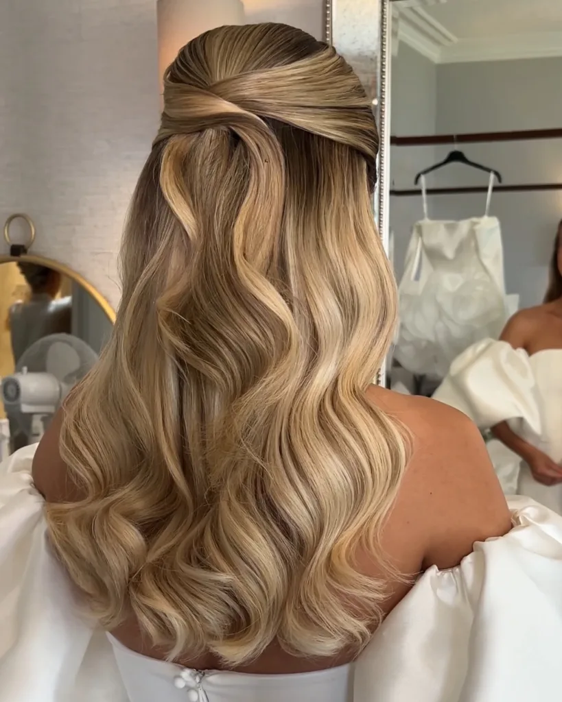 soft twist half-up with hollywood waves