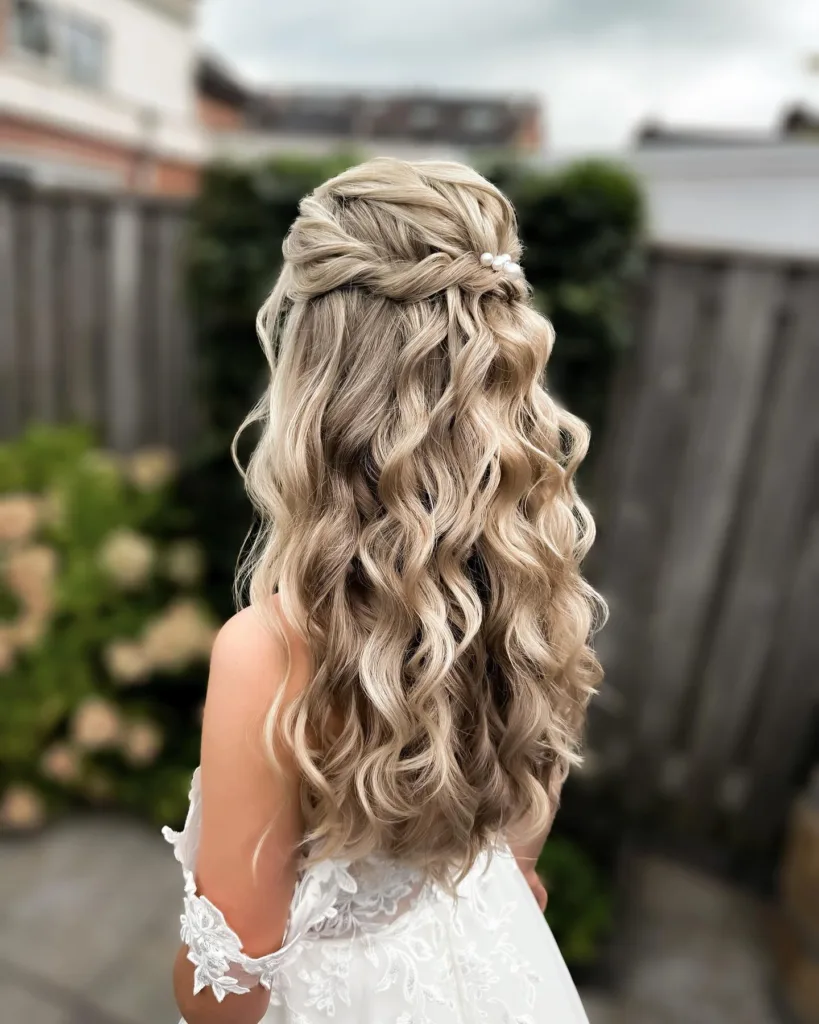 textured pearl half-up with beachy waves