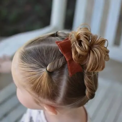 twists with messy top bun