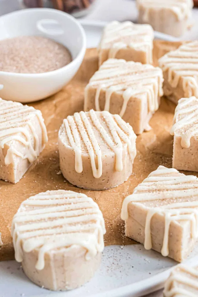 cinnabon fudge with white drizzle and cinnamon sugar