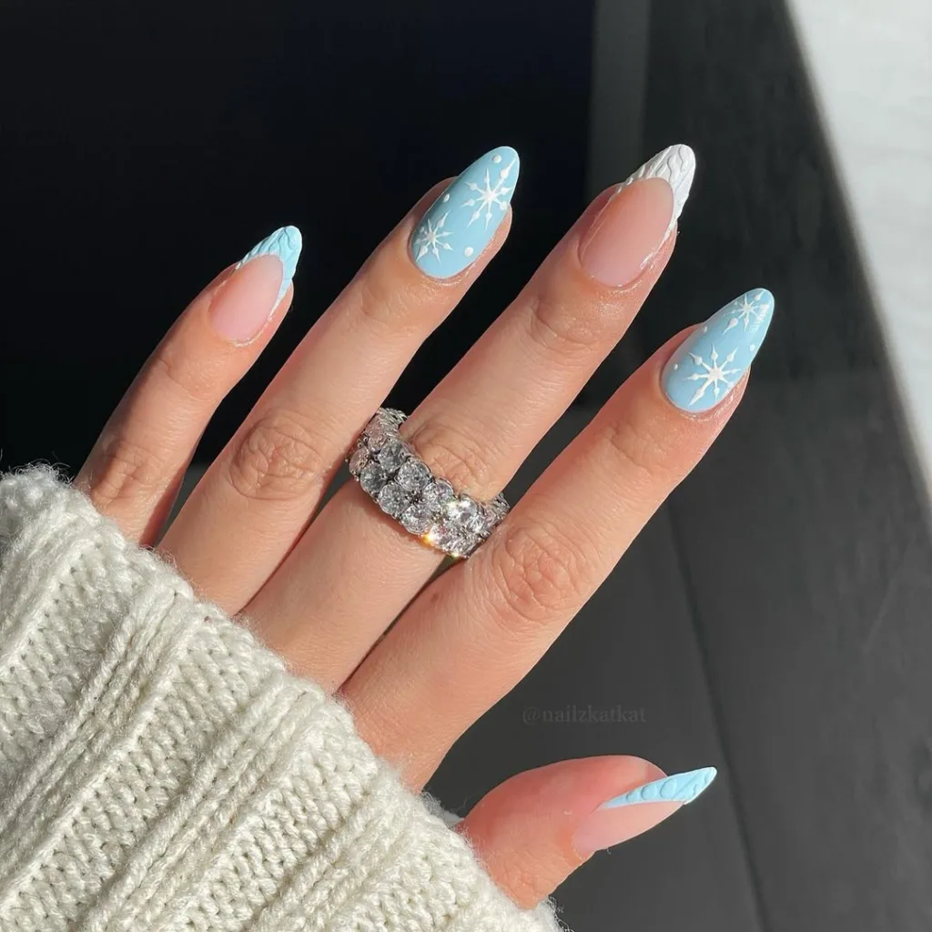 blue sweater snowflakes