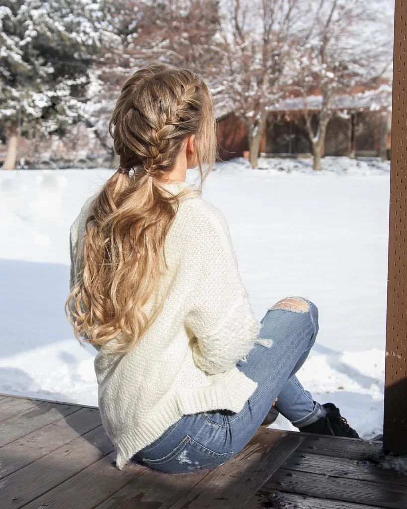 winter double dutch braids into curly ponytails