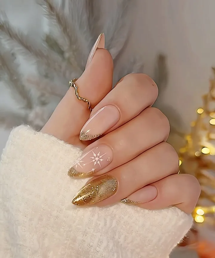 gold glitter snowflake nails