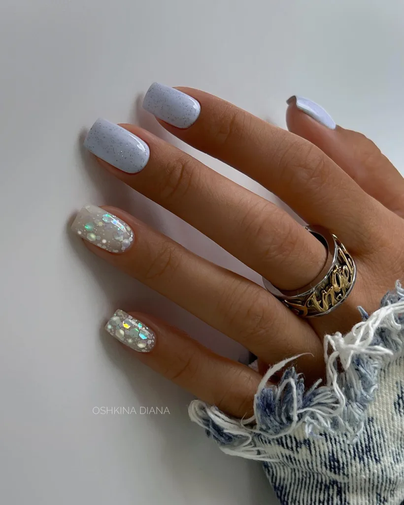 sparkly pale blue winter nails