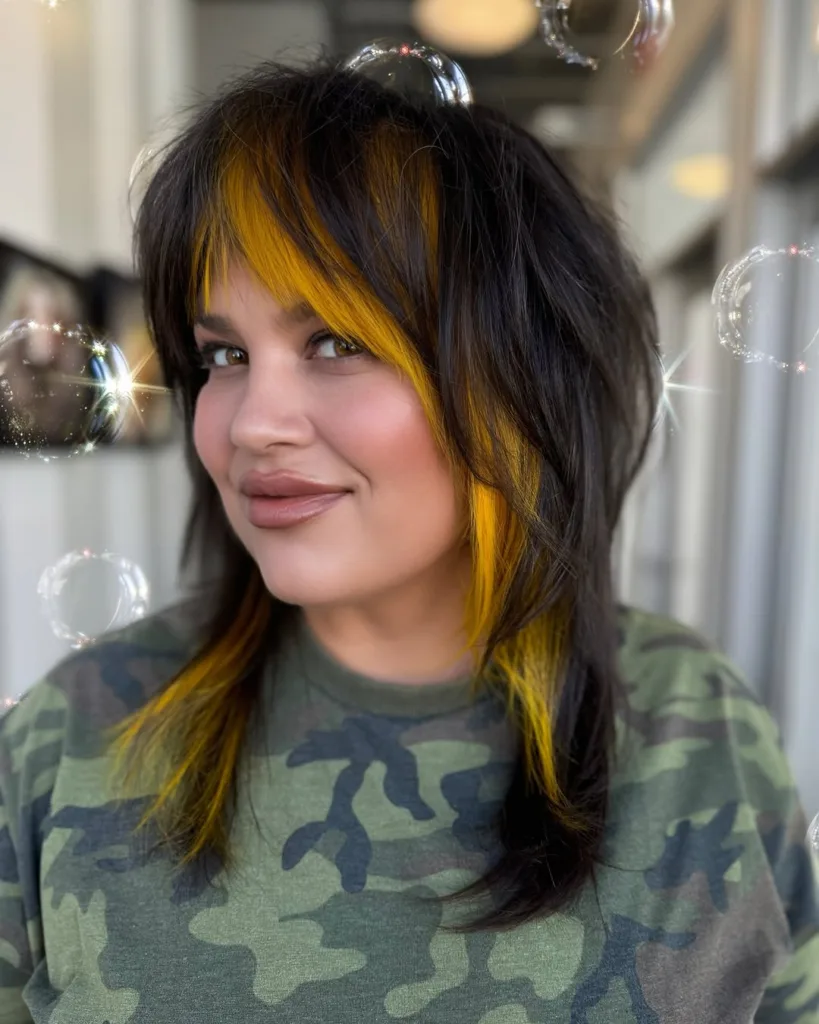 black and yellow color-block wolf cut