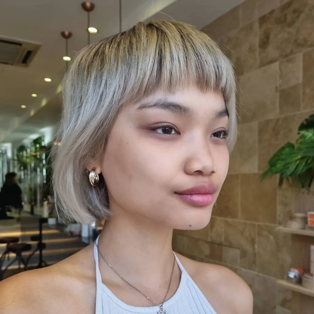 short blunt wolf cut with micro bangs