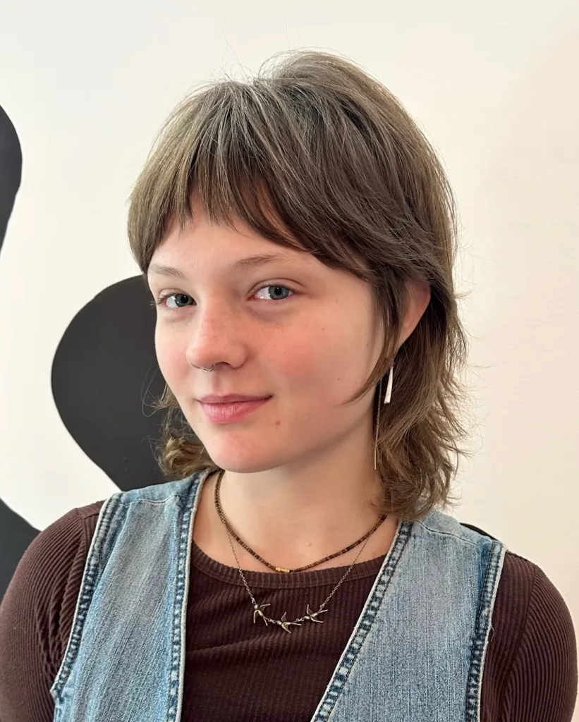 soft wolf mullet with baby bangs