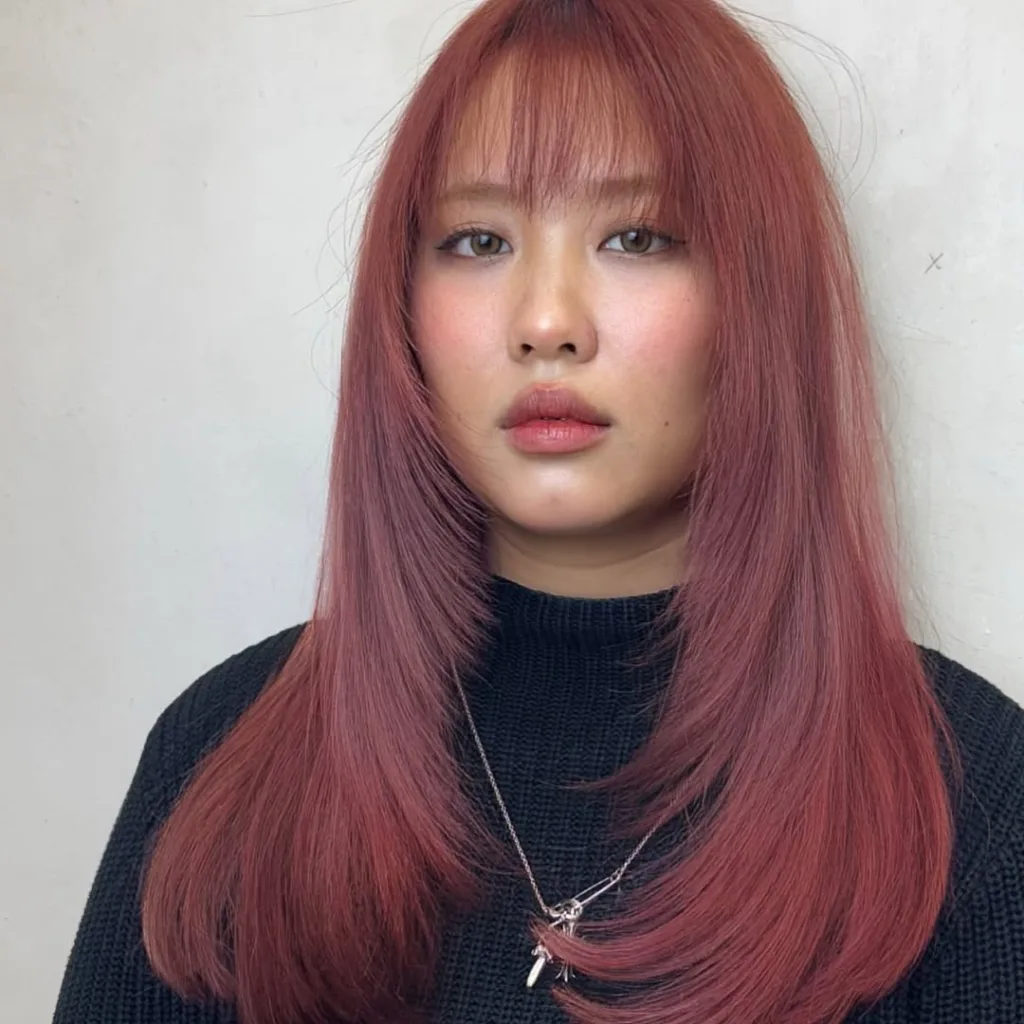 straight layered wolf cut with wispy bangs