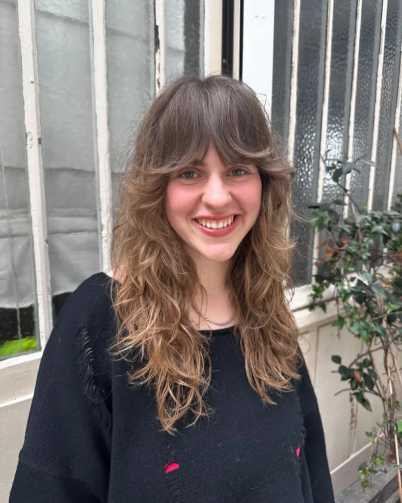 wavy wolf cut with big bangs