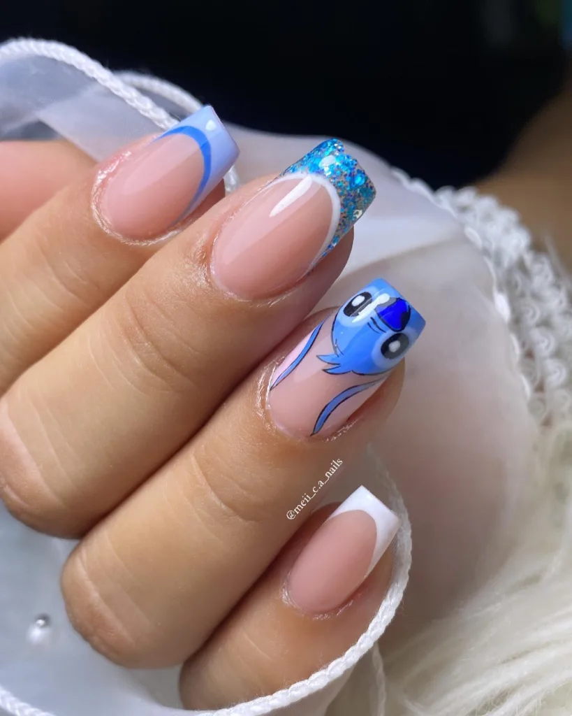 blue glitter stitch french tip nails