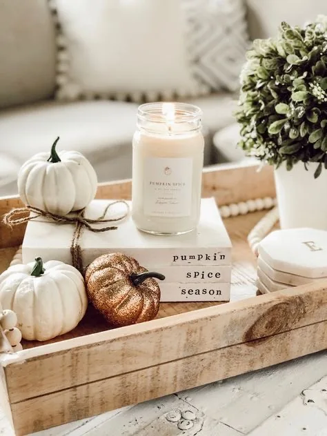 books as a riser for fall tray decorating