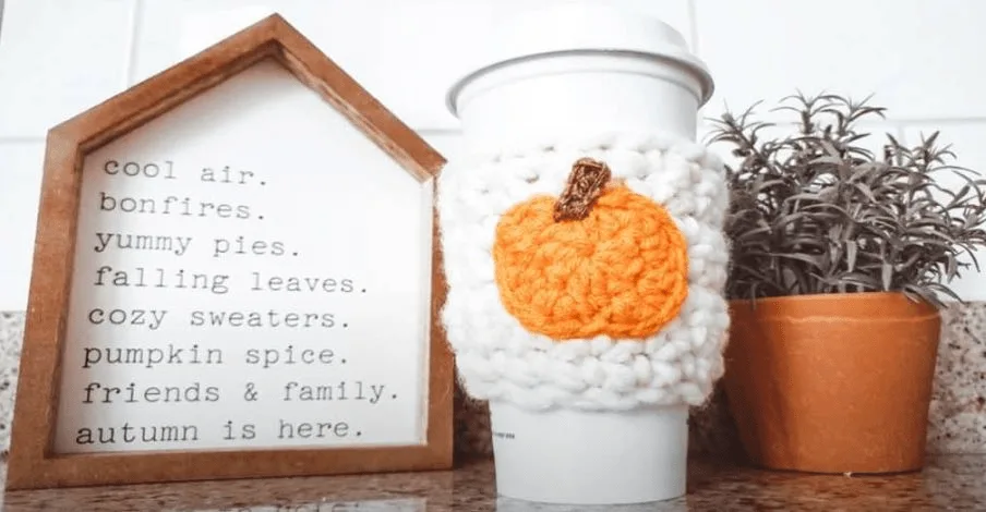 crochet pumpkin coffee sleeve