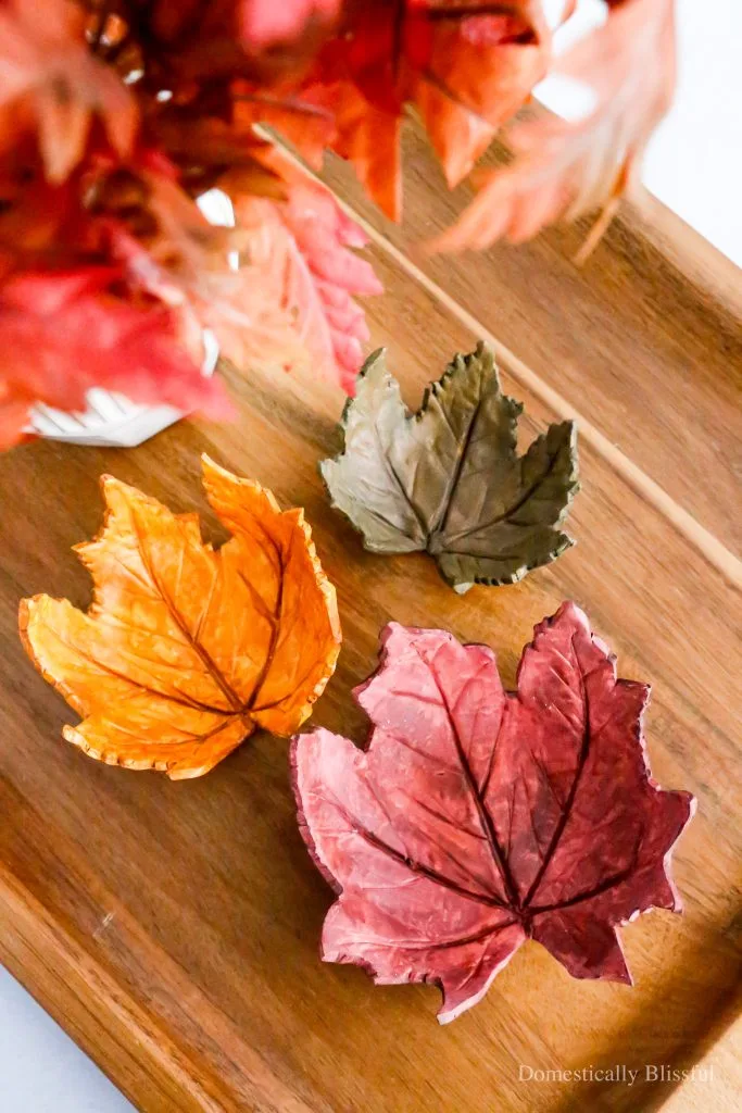 painted clay leaf bowls for easy autumn crafts for adults