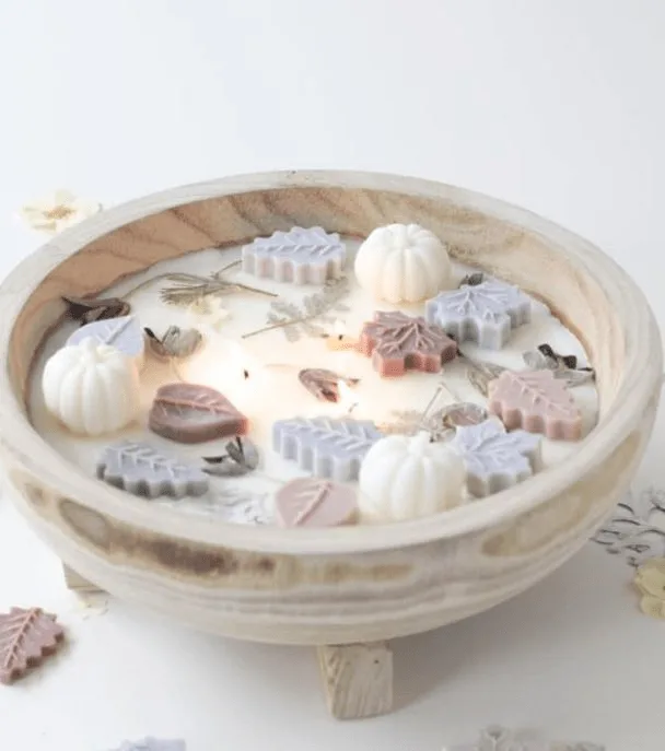 botanical candle with wax pumpkins and leaves for cozy DIY fall decor