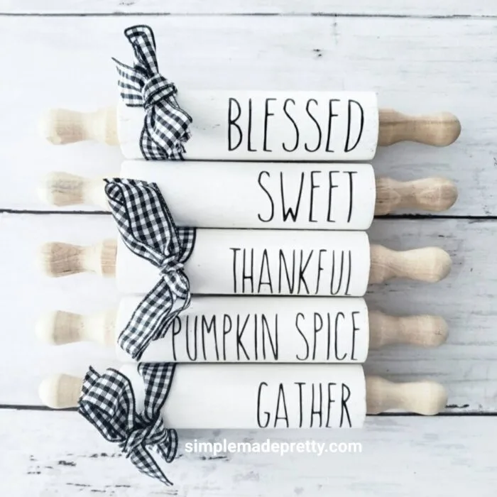 mini farmhouse rolling pins with fall sayings and buffalo check ribbon