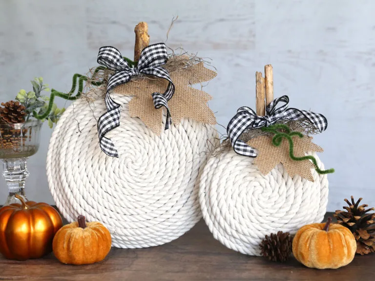DIY rope pumpkins with buffalo check bows for a rustic autumn craft
