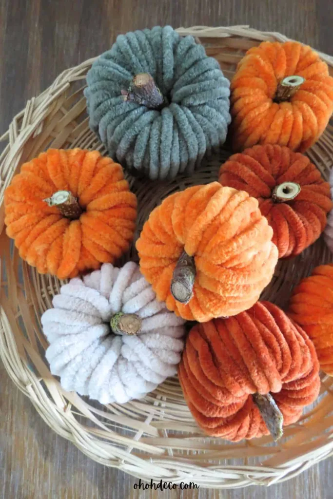 orange and neutral toilet paper roll pumpkins for easy fall crafts for adult